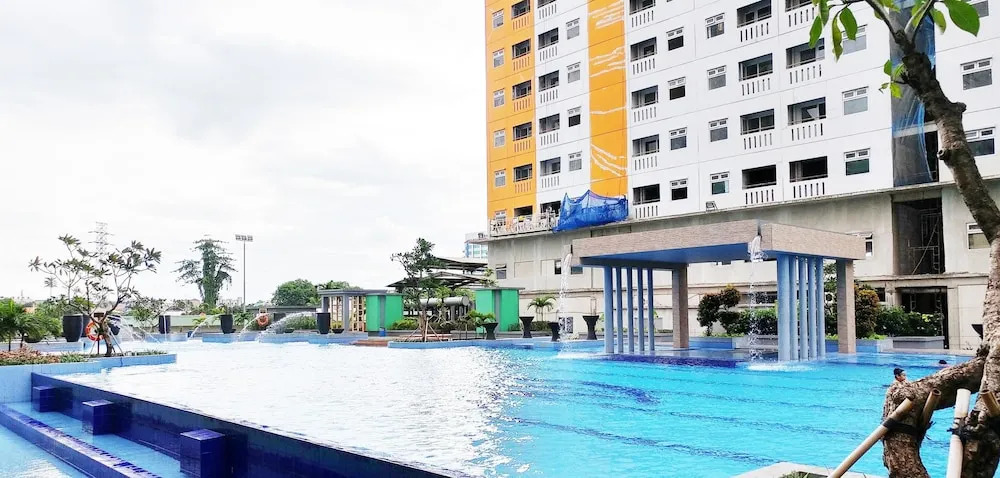 Furnished Studio with Comfortable Design Green Pramuka Apartment
