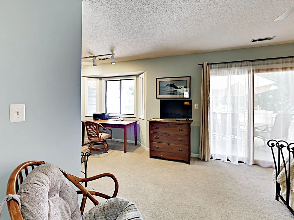 Sunny Coastal-chic W/ Private Deck & Sunroom 3 Bedroom Home