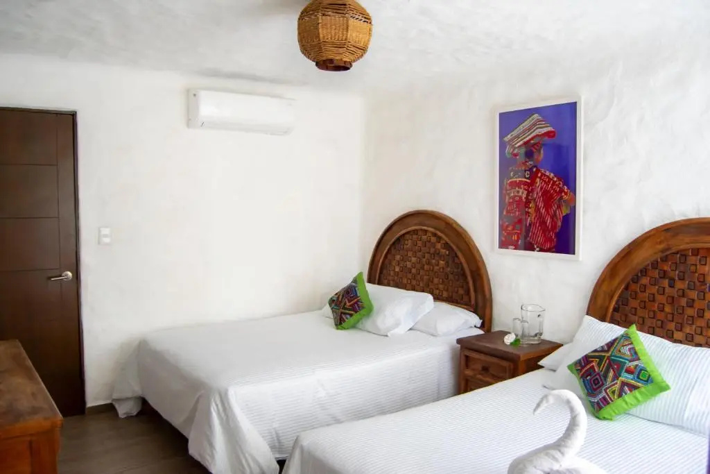 Четырёхместный люкс в Petit Hotel Pilitas