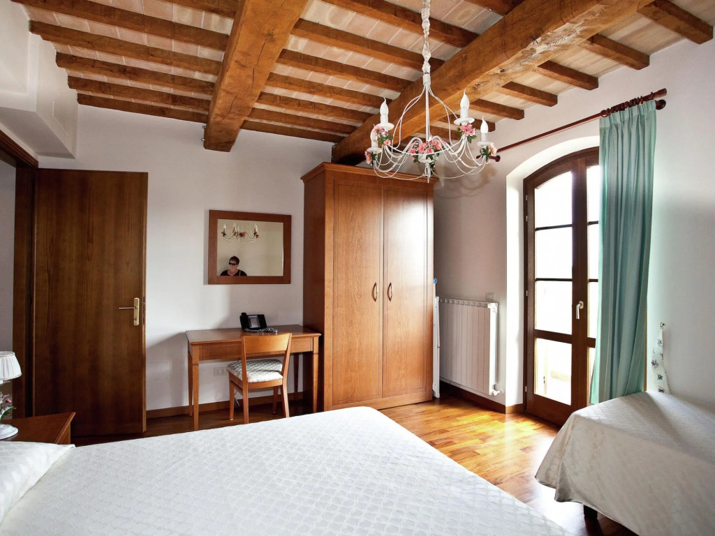 An agritourism complex with views of Assisi.