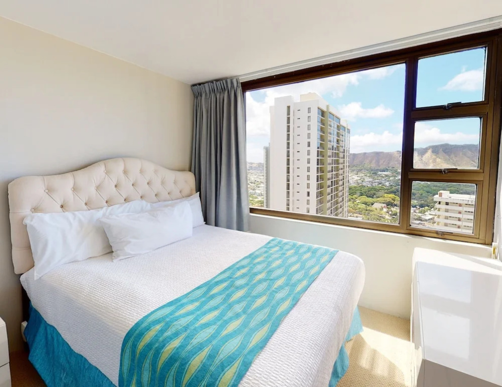 Waikiki Banyan High Level Condo with Ocean Views from the Private Lanai