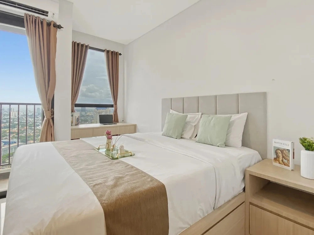 Homey Wooden Touch Studio At Apartment Ciputra World 2