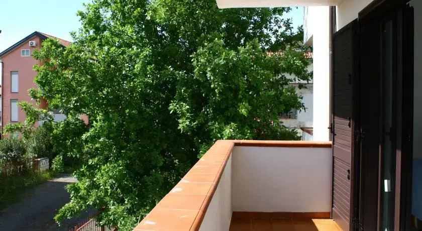 Casa, foresta e mare