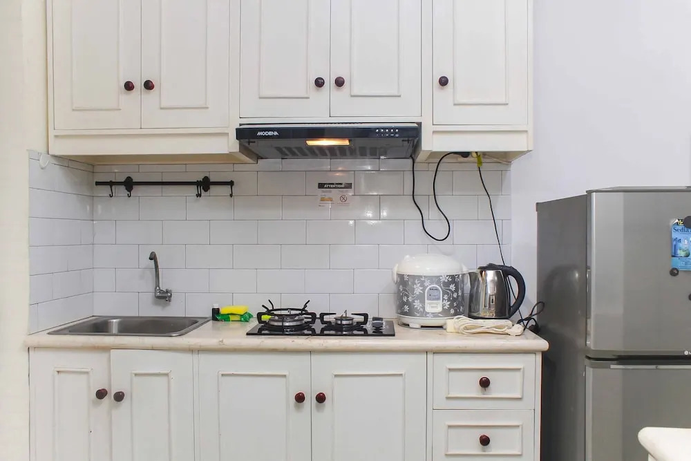 White and Nice 1BR at Bassura City Apartment