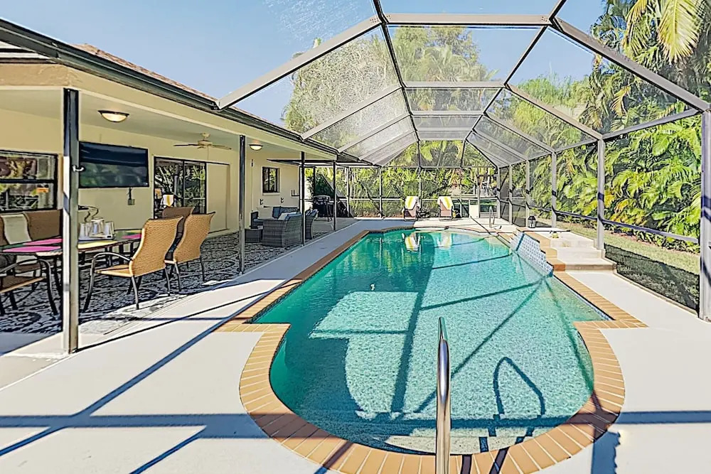 New Listing! Sparkling W/ Caged Pool & Lanai 3 Bedroom Home