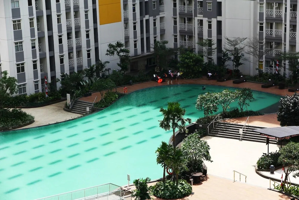 Comfortable Studio at Springlake Summarecon Apartment near Mall By Travelio
