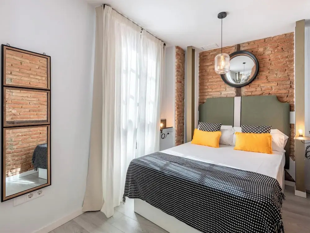 Apartamentos Puerta Elvira Suites 3000