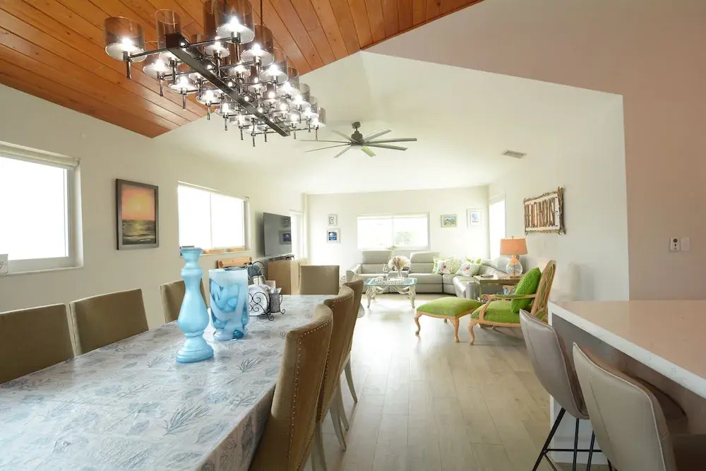 Beautiful Canal Front Home With Above Ground Pool, Dock And Fish Cleaning Station 4 Bedroom Home by RedAwning