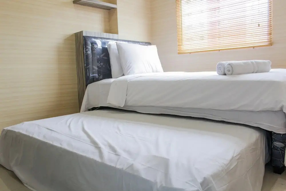 Minimalist 2BR at Green Pramuka Apartment near Shopping Mall