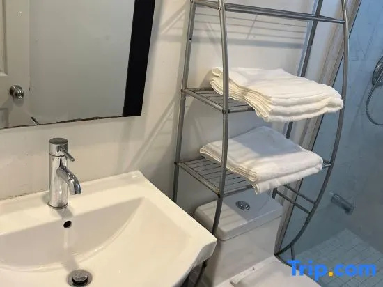 Self-contained Queen Suite • Private Kitchenette & Bath