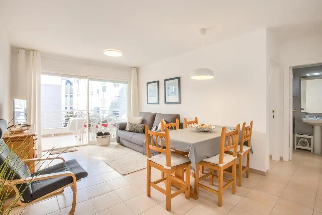 Lets Holidays White Apartment with Terrace, AC & Parking, Near Beach