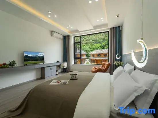 Listening to the wind · Courtyard Green Forest Rizhao Jinshan View Inn (Yulong Snow Mountain)
