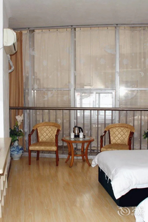 Qingdao Xiaogangwan Business Hotel