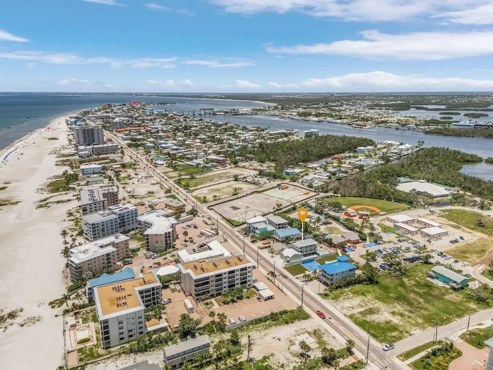 Coconut Sunsets A & B on Estero Blvd, 7 Bedroom Hom by RedAwning