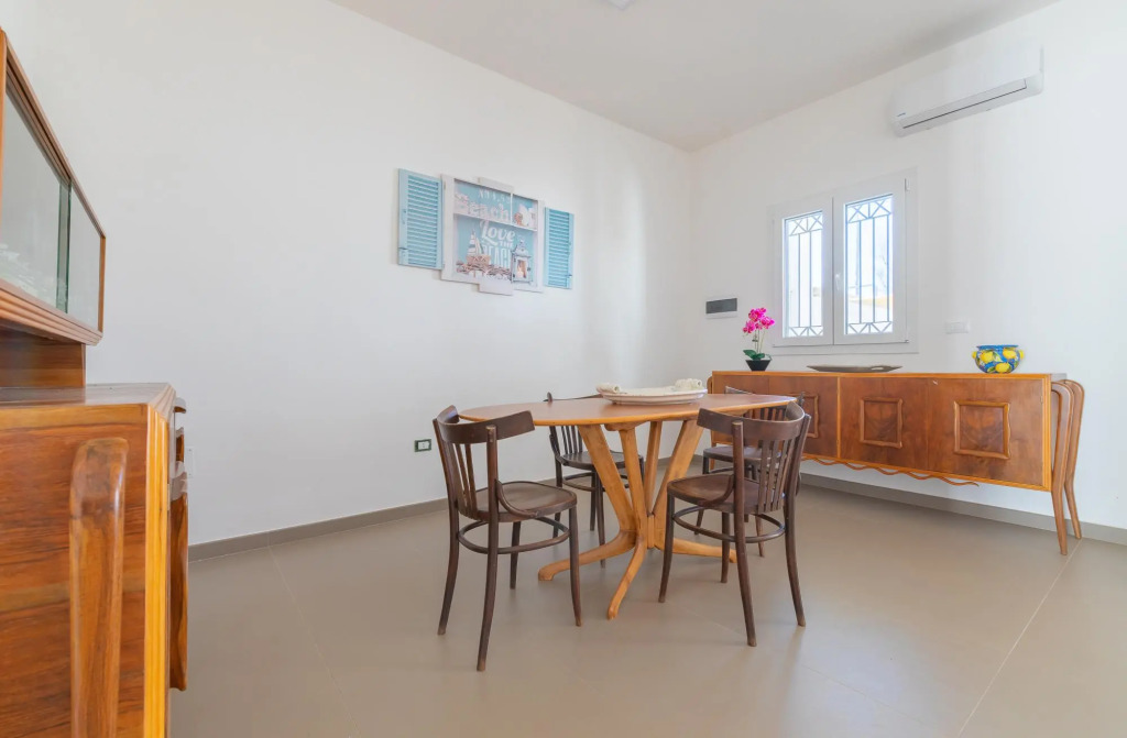Holiday home with veranda and parking near the sandy beach of Punta Prosciutto-Stella Marina