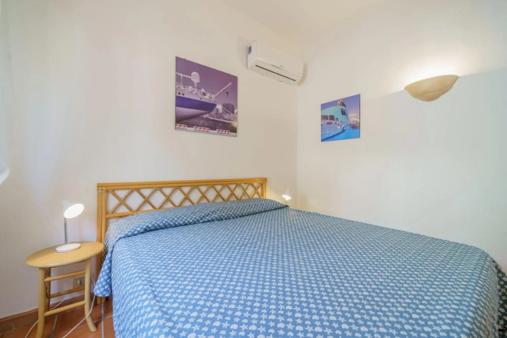 Baia Blu 2 in a small complex of colourful houses that directly overlooks the beach of Forno.-BAIA BLU N°2