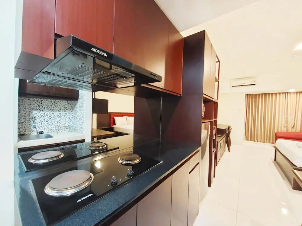 Brand New and Homey Studio at Mataram City Apartment By Travelio