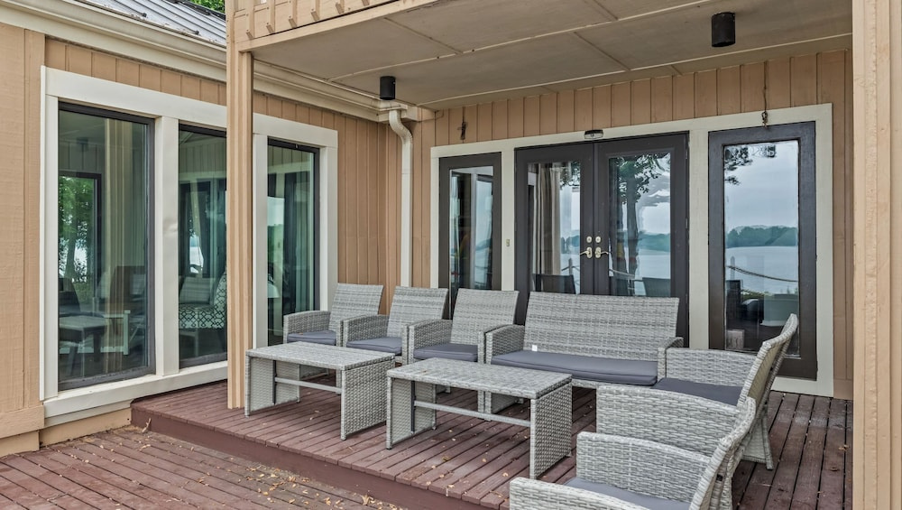 Waterfront Stay w/ Canoes, Deck, Game Room & Lake Views Near Mooresville Renwick Cove by Avantstay