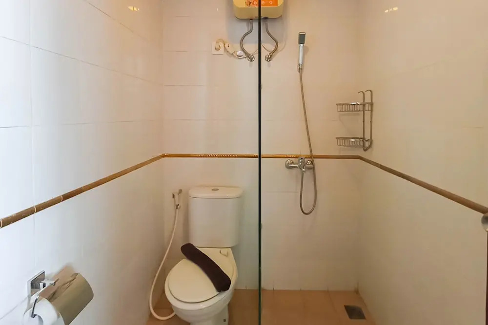 Full Furnished with Comfort Design 2BR at Vivo Apartment By Travelio