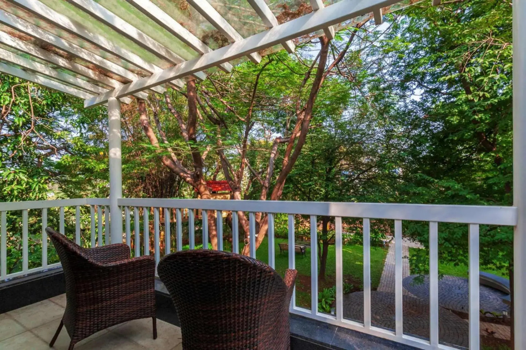 Morning Dew Retreat by StayVista - Modern interiors, Indoor games, Lush greenery, Pool & Gazebo await your escape