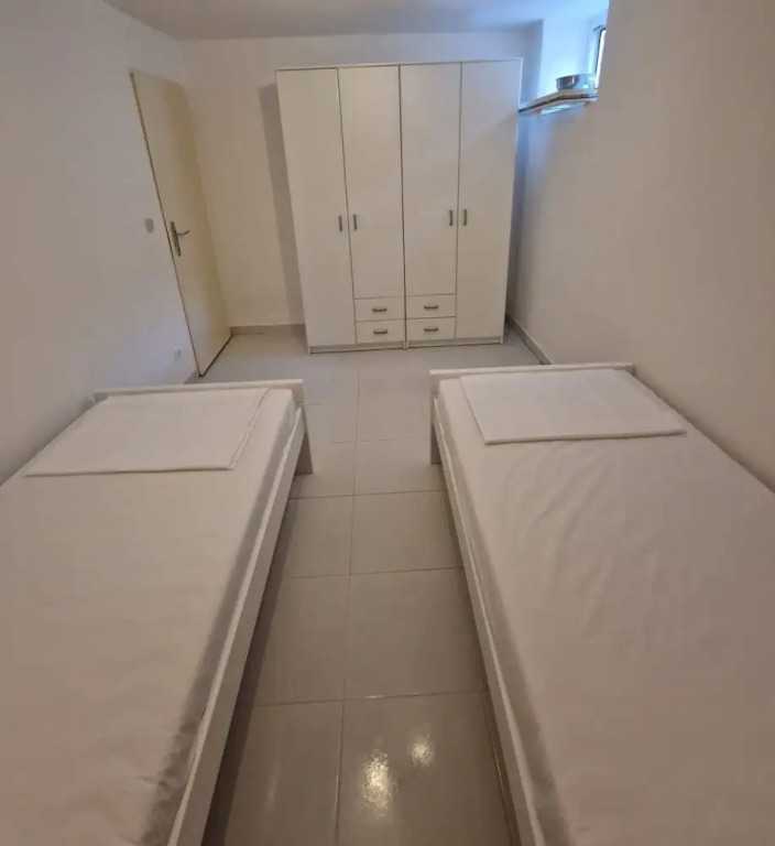 Four Bedroom apt w Patio Close to Beach and Center