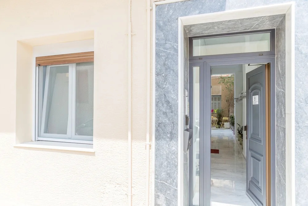 Grandma's Chic & Bright Athenian Home with a Patio
