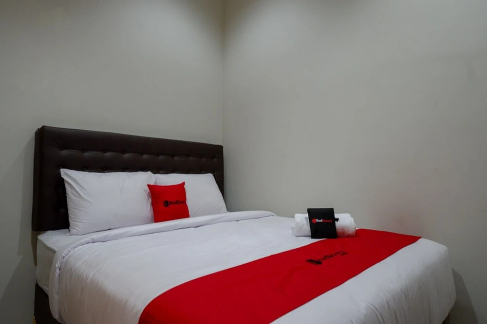 Gossip Guesthouse by Reddoorz