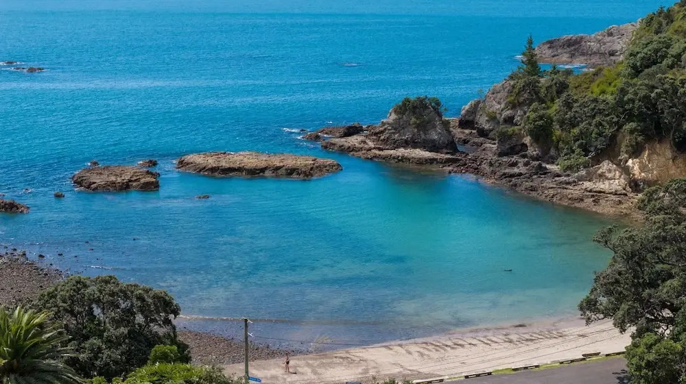 Drop Anchor at Enclosure Bay Beach by Waiheke Unlimited