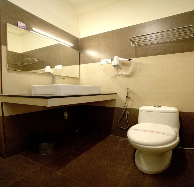 Blossoms Hotel & Service Apartments