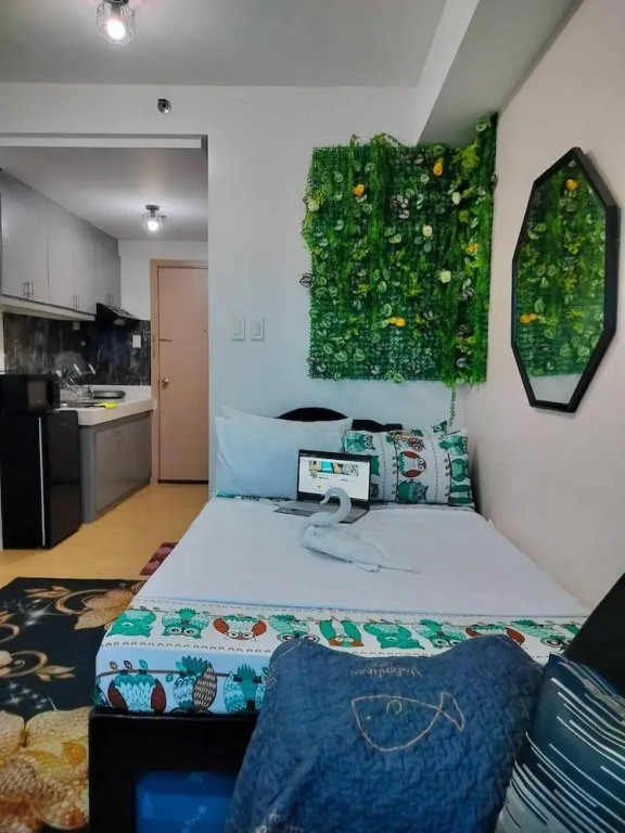 Cozy City View Condo in Quezon City - Your Home Away From Home