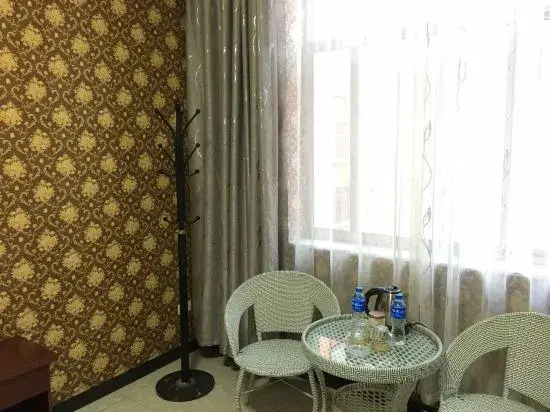 Qujing Ruixin Business Hotel
