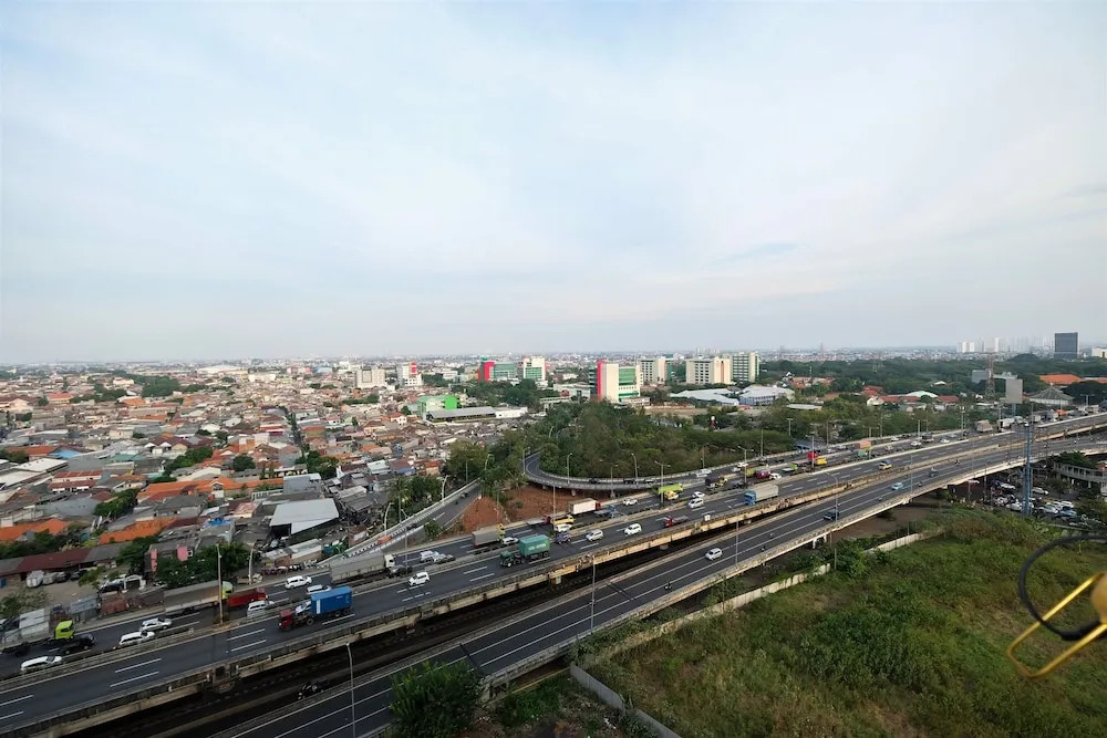 2BR Artistic Room Green Pramuka Apartment closed to Mall By Travelio