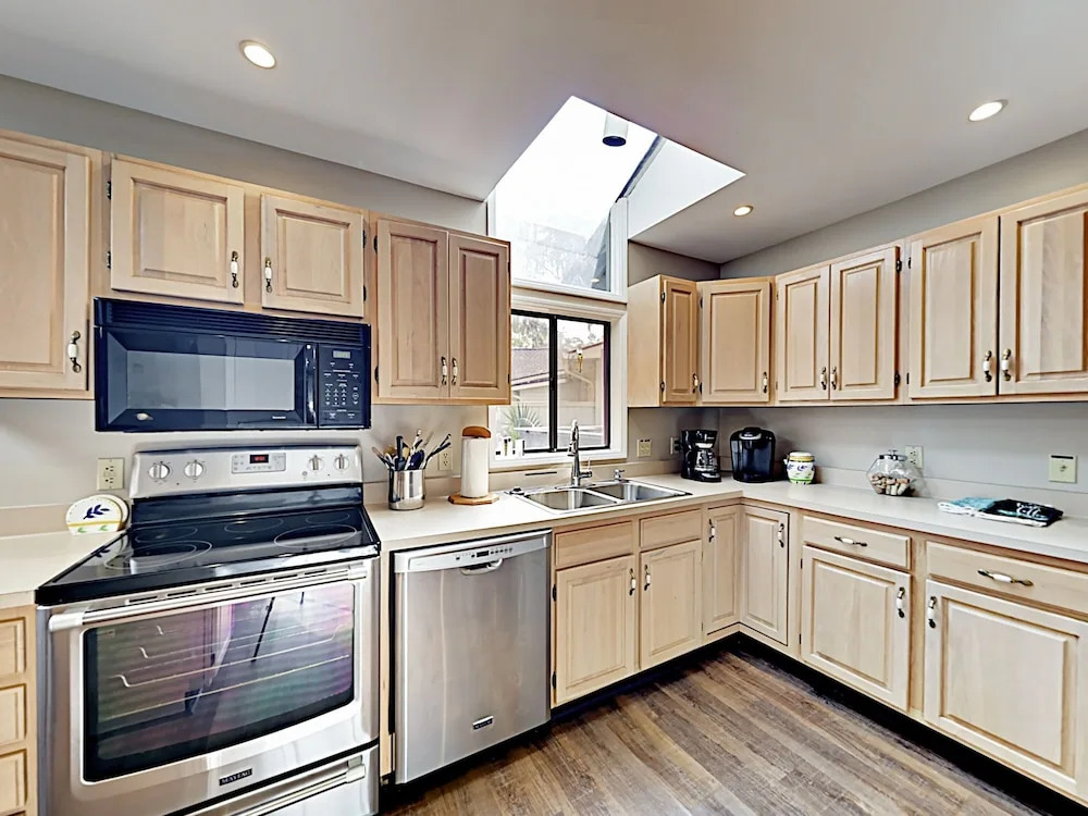 Sunny Coastal-chic W/ Private Deck & Sunroom 3 Bedroom Home