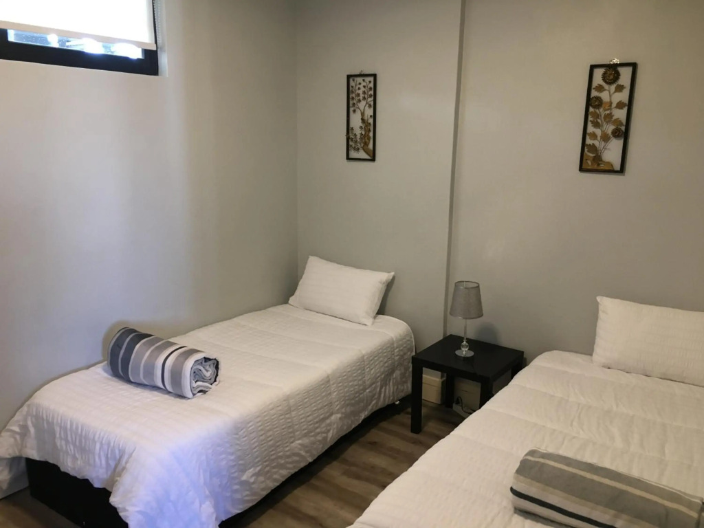 Highrise Windhoek apartment with skyline view, pool and gym