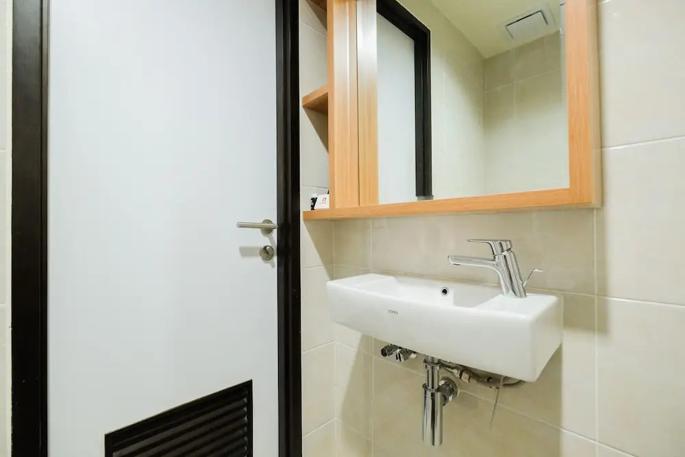 Tidy and Homey Studio Apartment at Mustika Golf Residence By Travelio