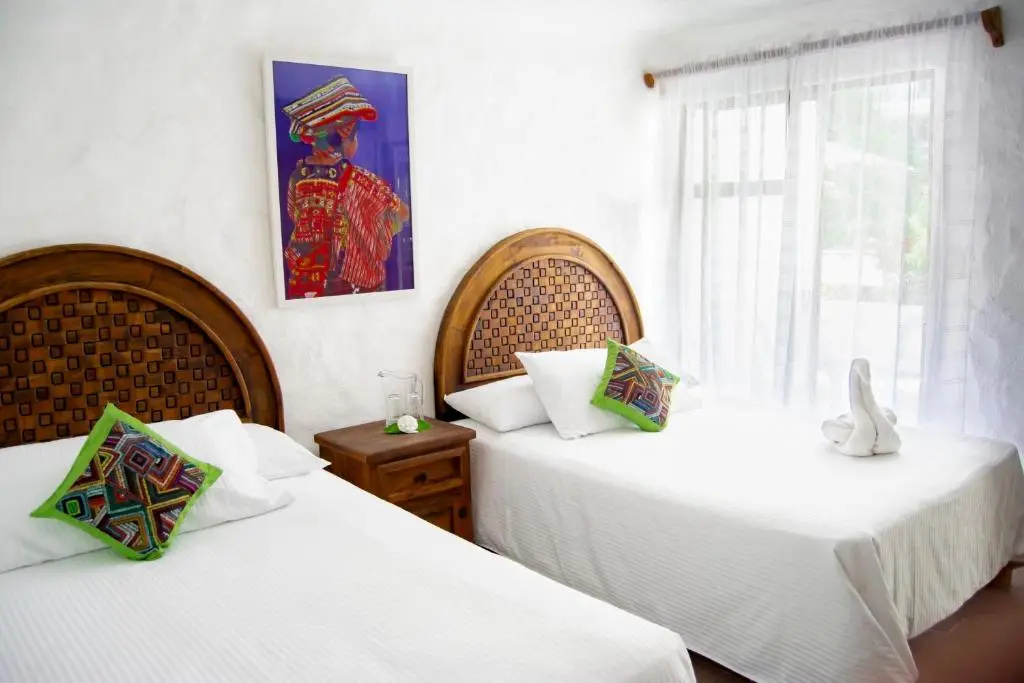 Четырёхместный люкс в Petit Hotel Pilitas