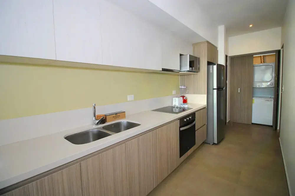 Desirable 1 BR Condo at Solea by Happy Address