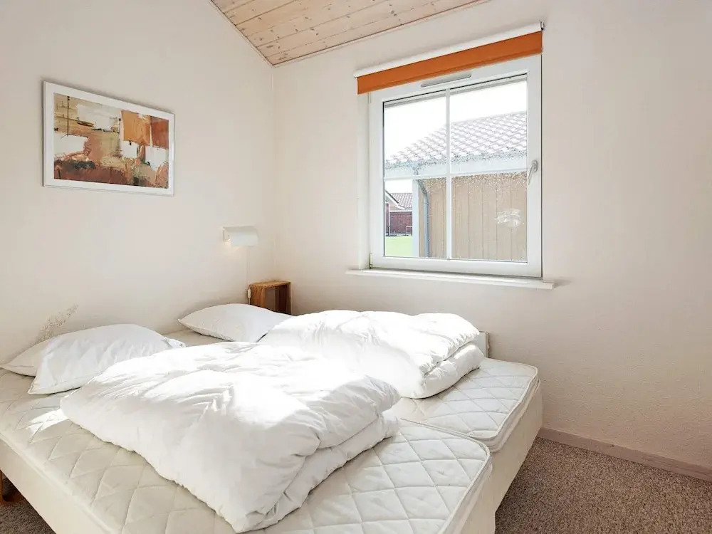 8 person holiday home on a holiday park in Gråsten