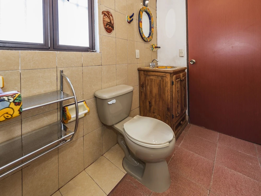 Capital O Las Calzadas Hotel & Suites