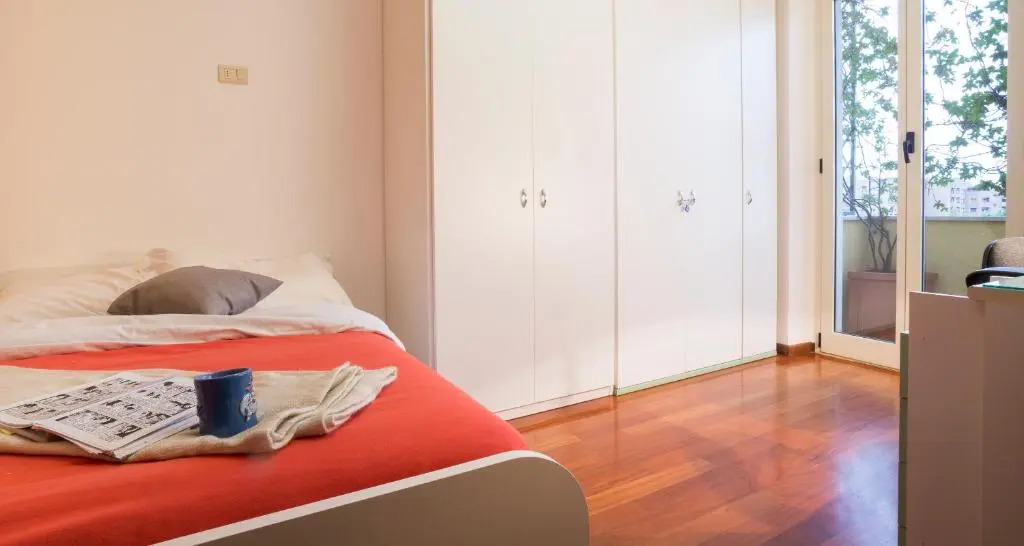 ALTIDO Warm Family Flat for 6 with Terrace in Milan