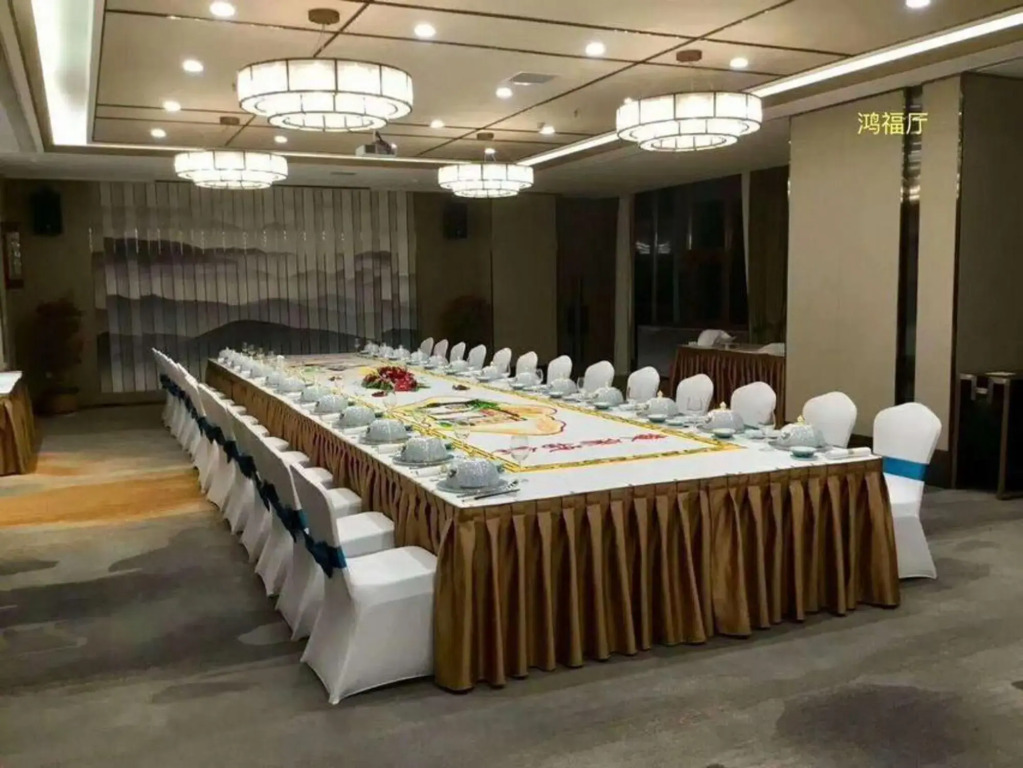 Xinzheng Xingangwanhua Hotel
