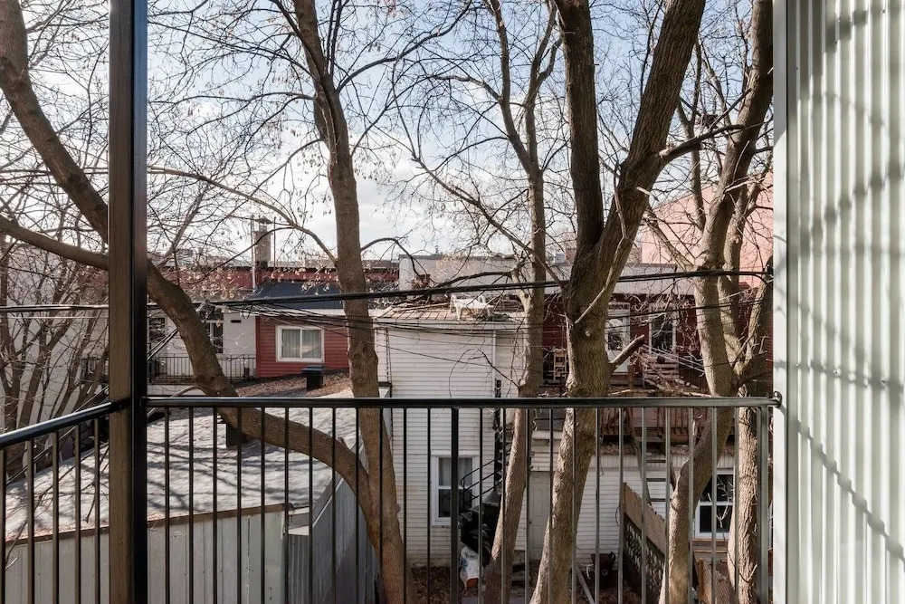 Discover Little Italy From a Bright Apartment