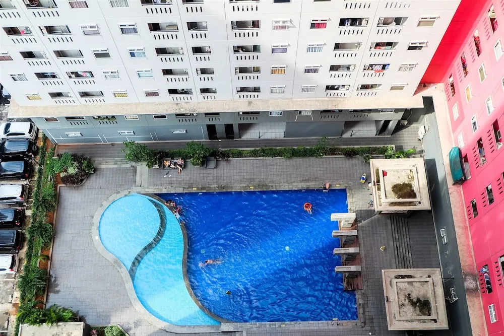 Furnished Green Pramuka 1BR Apartment with Modern Style and City View