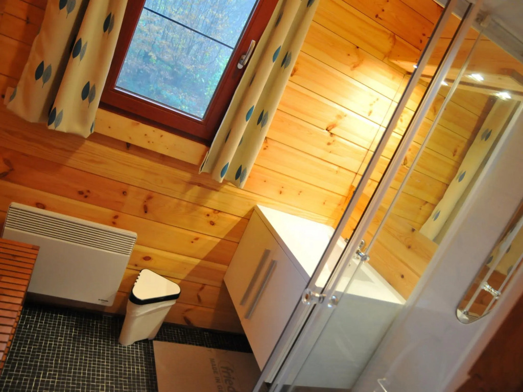 Wooden Chalet With Stove and Microwave Located in the Forest