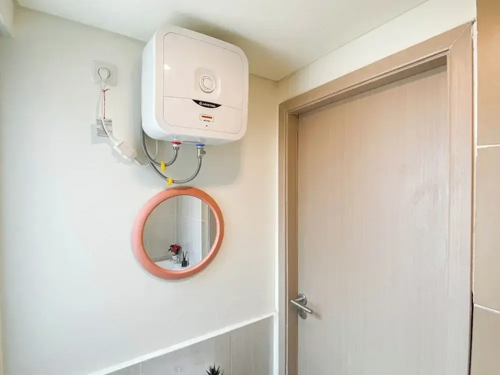 Warm Minimalist Studio Apartment Near Paramadina University At Meikarta