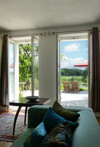 Villa am Trumpf - Design-Appartements im Naturgarten am See
