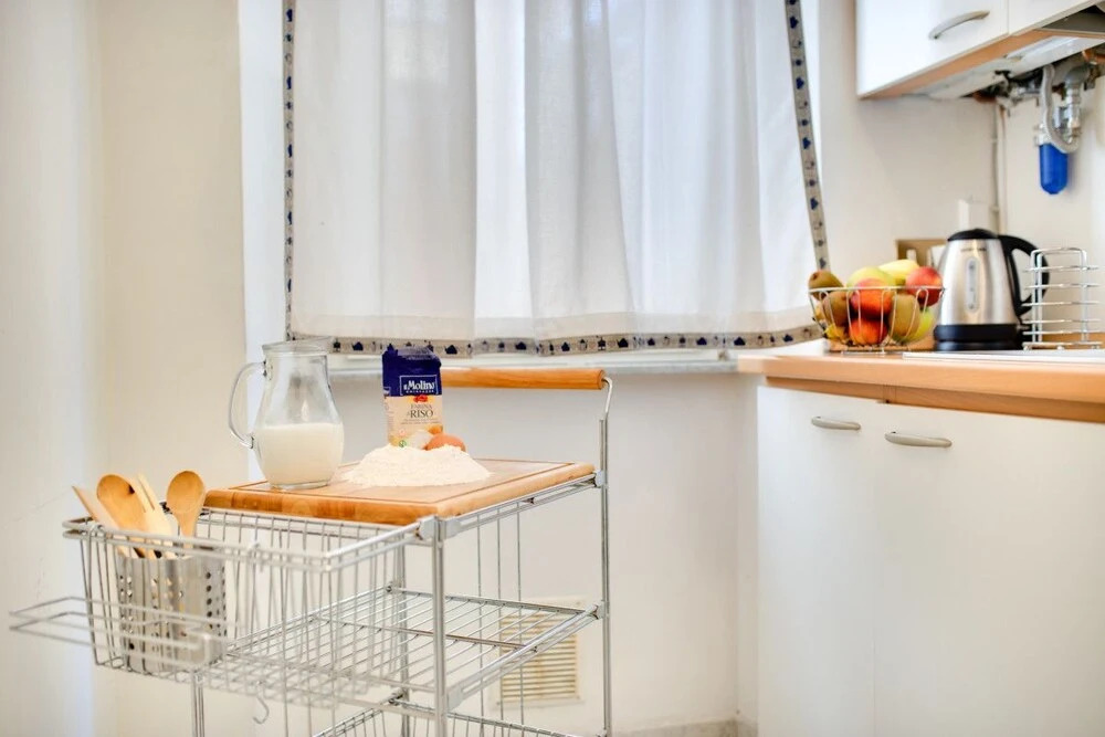 2 Bed Apt w/ Terrace Near Collosseum, Serviced by Hostmaker