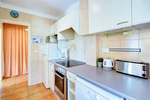 Apartamento con jardín y parking cerca del mar en Roses