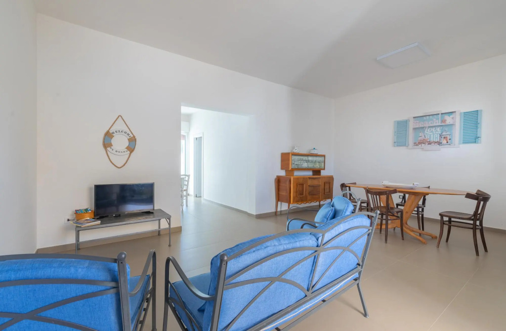 Holiday home with veranda and parking near the sandy beach of Punta Prosciutto-Stella Marina