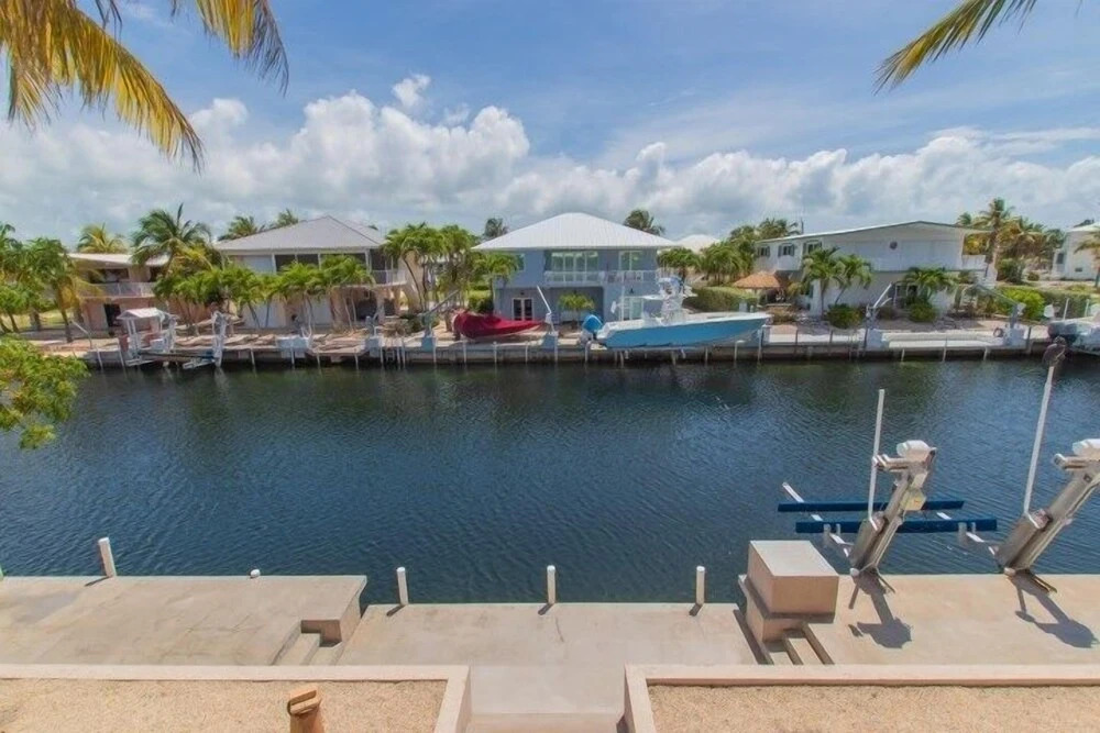 Beautiful House Located In The Prestigious Neighborhood Of Port Antigua On A Deep, Wide Canal. 4 Bedroom Home by RedAwning